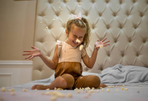istock Happy Girl Jumping on the bed 1272683967