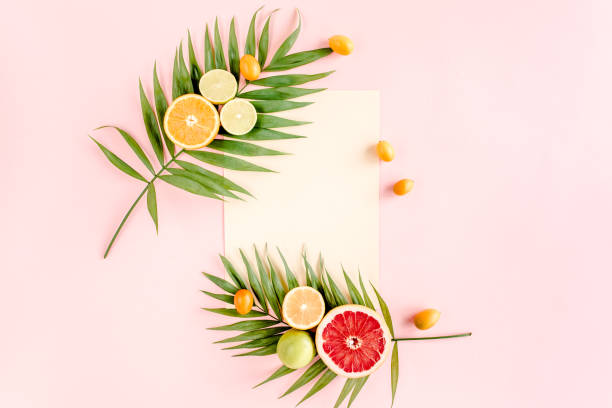 istock Female hand holding half coconut on white background. flat lay, top view 1272689890
