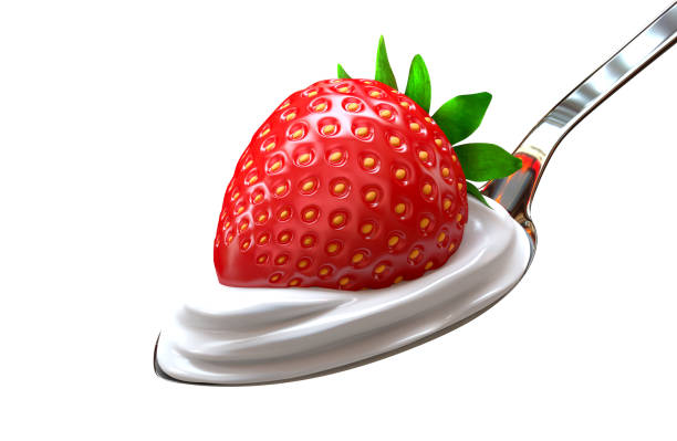 istock Strawberry with green leaves on spoon with vanilla 1272692090