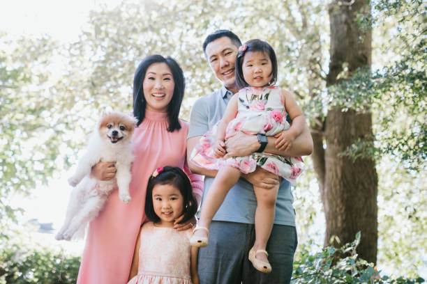 istock Family Enjoying Walk On Sunny Summer Day 1272693747