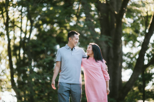 istock Beautiful Korean Couple Outdoors on Summer Day 1272694522