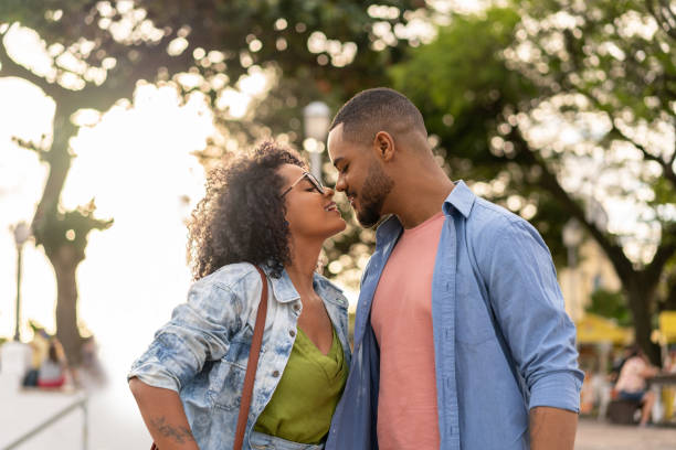 istock Loving afro couple in the publiic park 1272694652