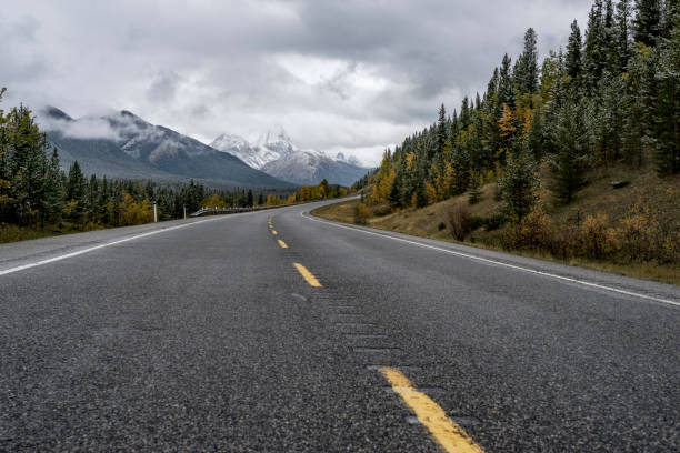 istock winding mountain road in Banff National Park 1272710246
