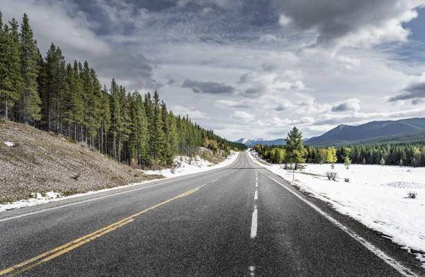 istock winding mountain road in Banff National Park 1272710329