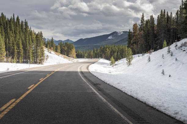 istock winding mountain road in Banff National Park 1272710424