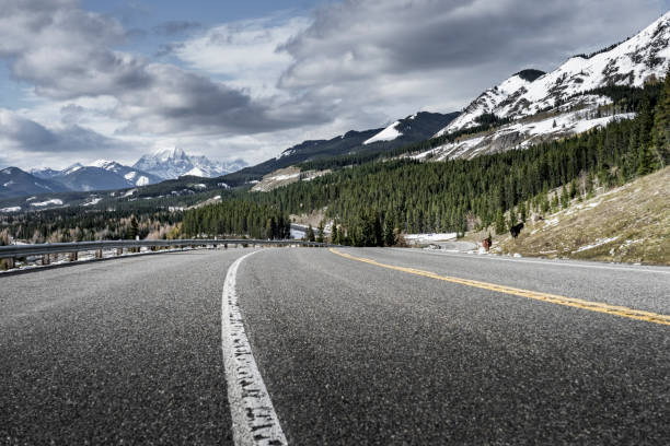 istock winding mountain road in Banff National Park 1272710443