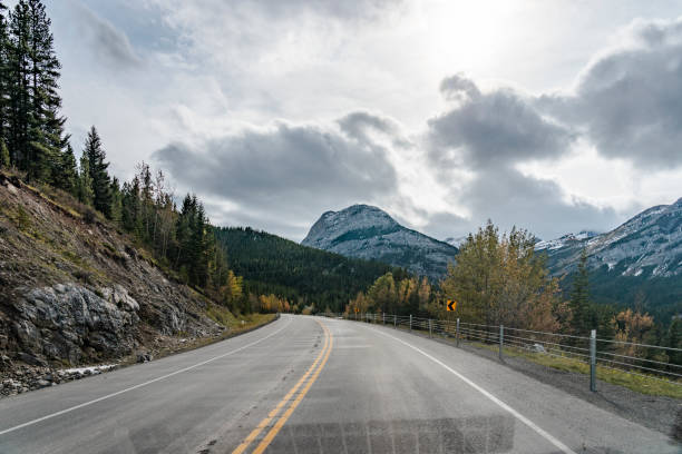 istock winding mountain road in Banff National Park 1272710969
