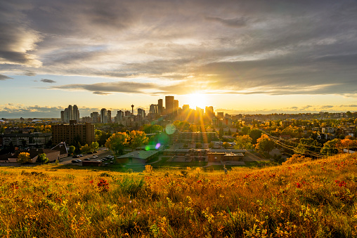 Calgary, Panoramic view of city at sunset in the fall .