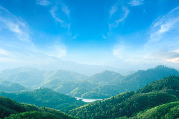 world environment day concept: green mountains and beautiful blue sky clouds - mountain valley river water imagens e fotografias de stock