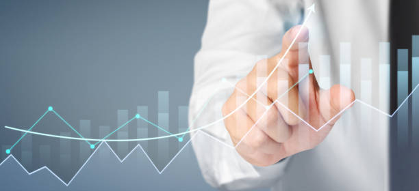 istock Businessman plan graph growth and increase of chart positive indicators 1272712338