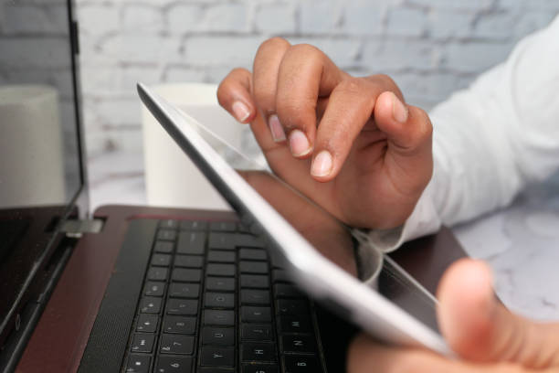 istock man's hand working on digital tablet at office desk 1272714196