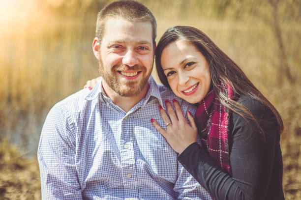 istock Real couple outdoors in happy portrait 1272716010