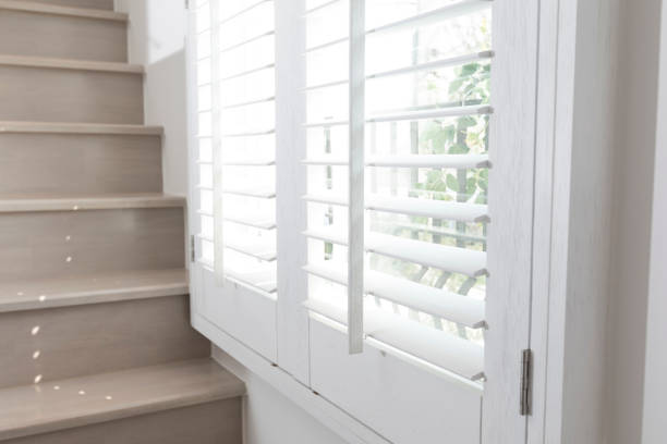 istock Closeup view of window with horizontal blinds. 1272717177