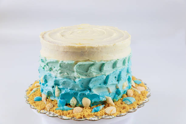istock Party cake decorated with shell and sand. 1272720960