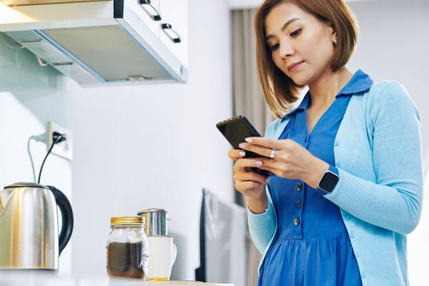 istock Woman answering text messages 1272721115