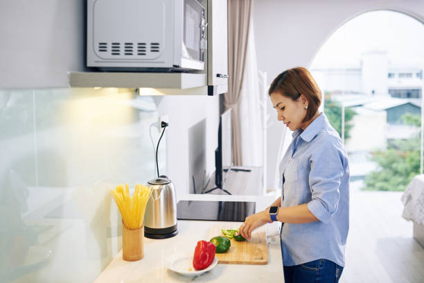 istock Housewife cooking salad 1272721119
