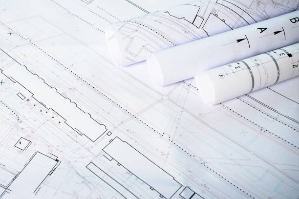 istock Paper architectural drawings and blueprint, interior design plans and projects 1272721984