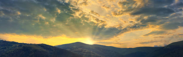 istock Orange panorama sunset sky and cloud mountains 1272722717