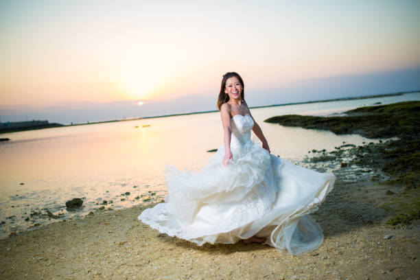 istock Bride on the beach at sunset 1272722853
