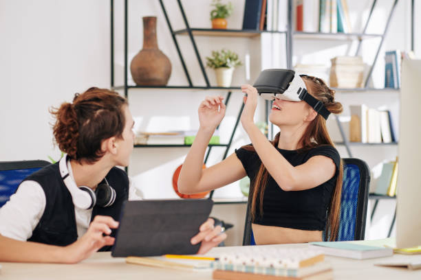 istock Teenagers test VR headset 1272723693