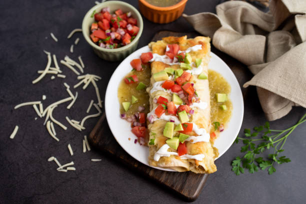 istock Honey lime chicken enchiladas with toppings 1272727505