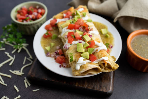 istock Honey lime chicken enchiladas with toppings 1272728242