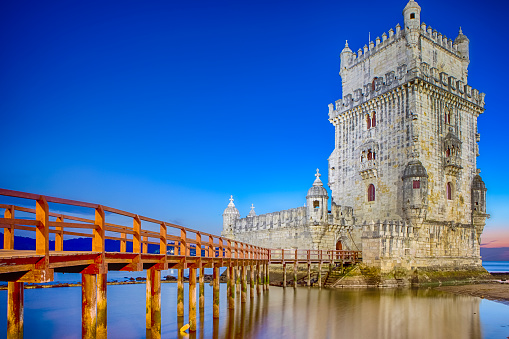 Ancient Belem Tower on Tagus River in Lisbon at Blue Hour in Portugal.Horizontal Image