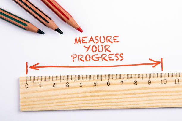 istock MEASURE YOUR PROGRESS. Wooden liner and colored pencils 1272732972