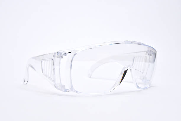 istock Protective transparent plastic eyewear glasses on white background 1272740353