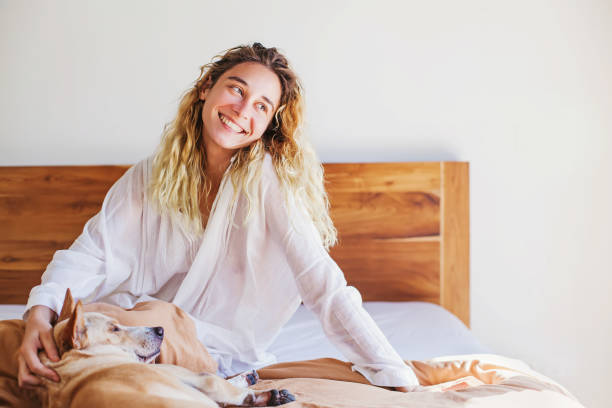 istock Dog owner relaxing at home 1272740583