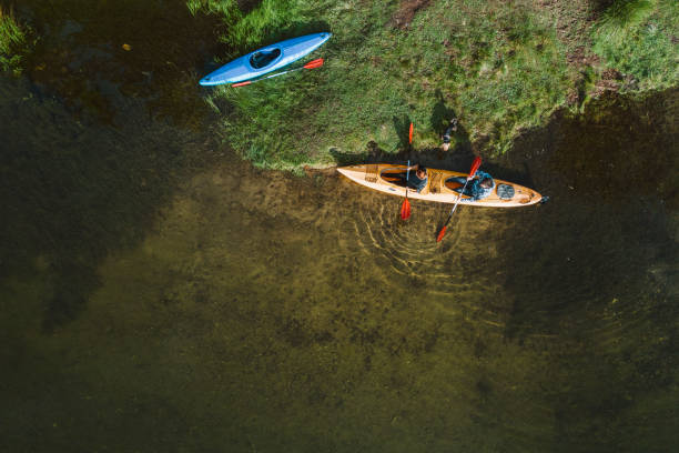 istock Couple Kayaking In Nature. 1272743520