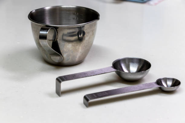 istock Metal measuring cup and measuring spoon 1272744602
