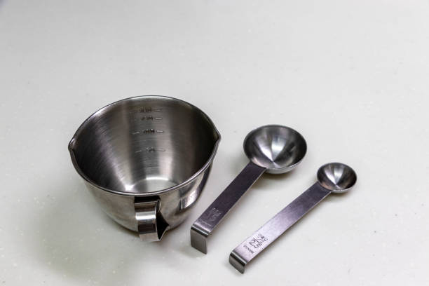 istock Metal measuring cup and measuring spoon 1272744622