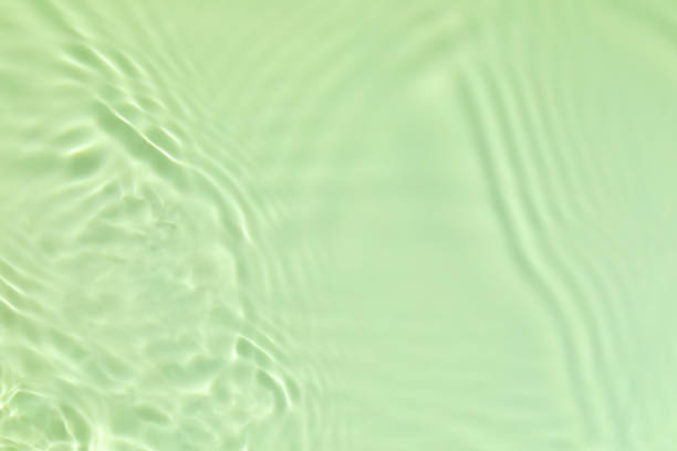 istock green transparent clear water surface texture summer background 1272747868