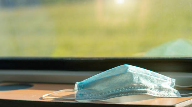 istock Empty inside train bus subway public transport with window view and blue seats people tourist new normal social distancing safe travel with hygiene face mask protect from covid corona virus 1272754838