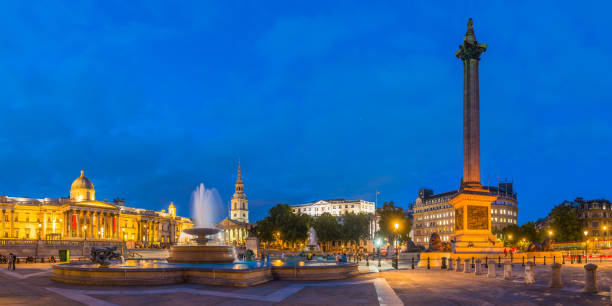 istock London Trafalgar Square Nelsons Column illuminated at dusk panorama UK 1272757872