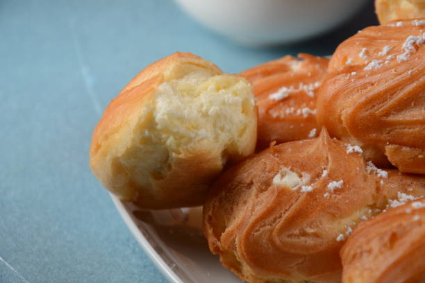 istock Traditional french dessert eclair with custard 1272759002