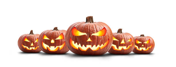 istock A group of five lit spooky halloween pumpkins, Jack O Lantern with evil face and eyes. 1272761063