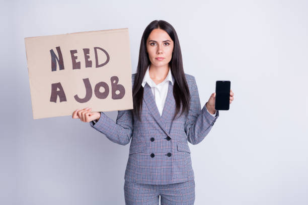 istock Need job use smartphone. Serious boss banker financier loss work hold modern technology browse market website wear checkered plaid pants trousers blazer isolated gray color background 1272761139