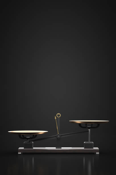 Unbalanced kettlebell scales. Dark room. Copy space