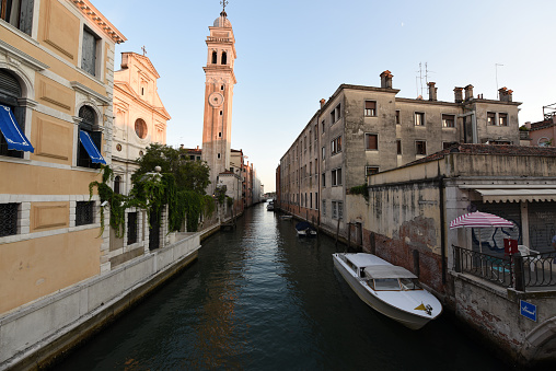 A typical venetian channel captured in the evening during the wordwide coronaviurs pandemic.