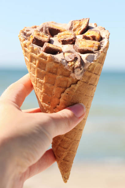 istock Ice cream cone with pieces of chocolate 1272764313