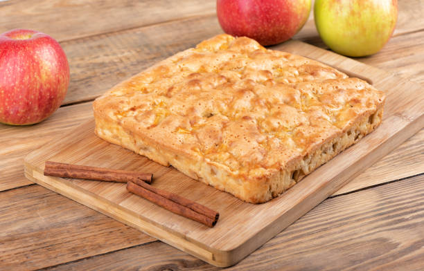 istock Homemade cinnamon apple pie on a cutting board. 1272770351