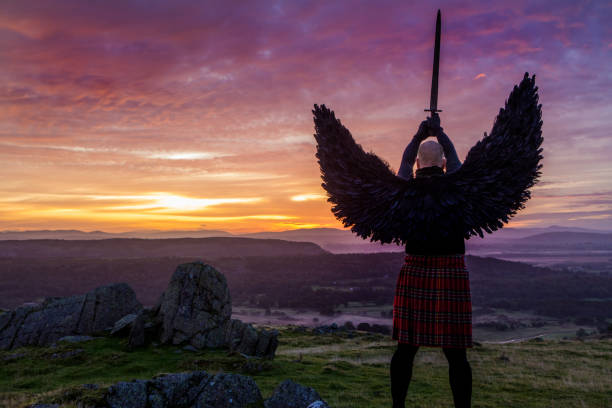 istock Black Winged Warrior Angel at dawn 1272775262