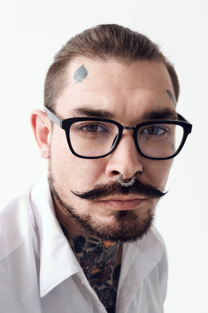 istock Portrait of stylish tattoo master 1272775428