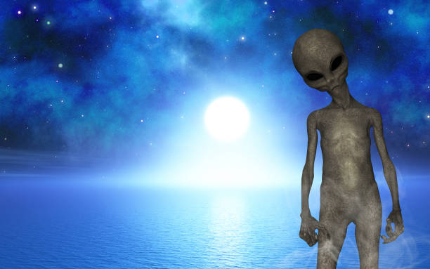 istock 3D Halloween landscape with alien against ocean space scene 1272776136