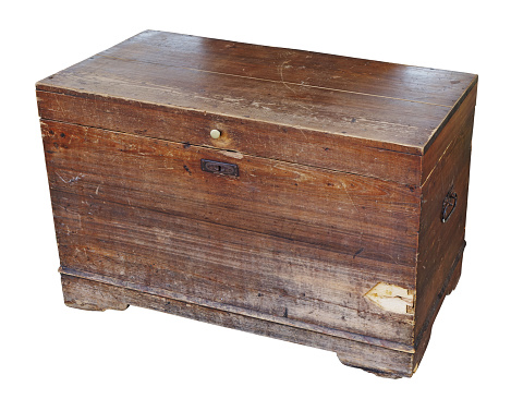 Old vintage rustic clothes storage chest isolated