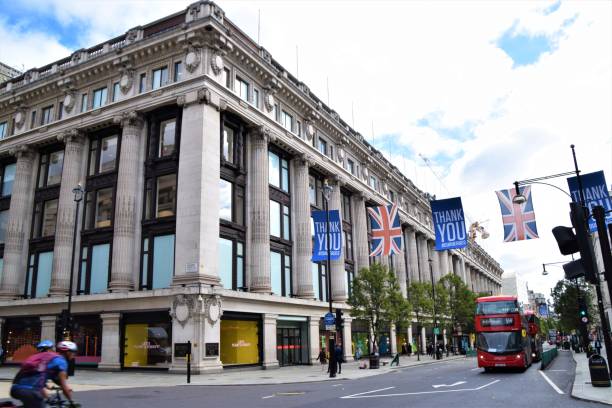 Selfridges department store and Oxford Street view, London London, United Kingdom - August 26 2020: Selfridges department store and Oxford Street daytime view harrods photos stock pictures, royalty-free photos & images