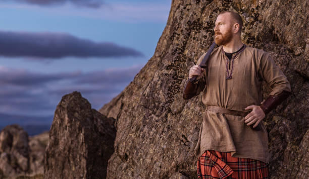 istock Scottish Redhead Warrior wearing a kilt 1272779436