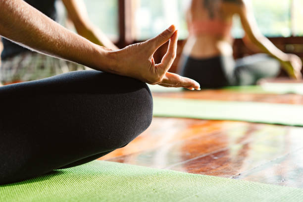 istock Crop woman meditating in studio 1272779618